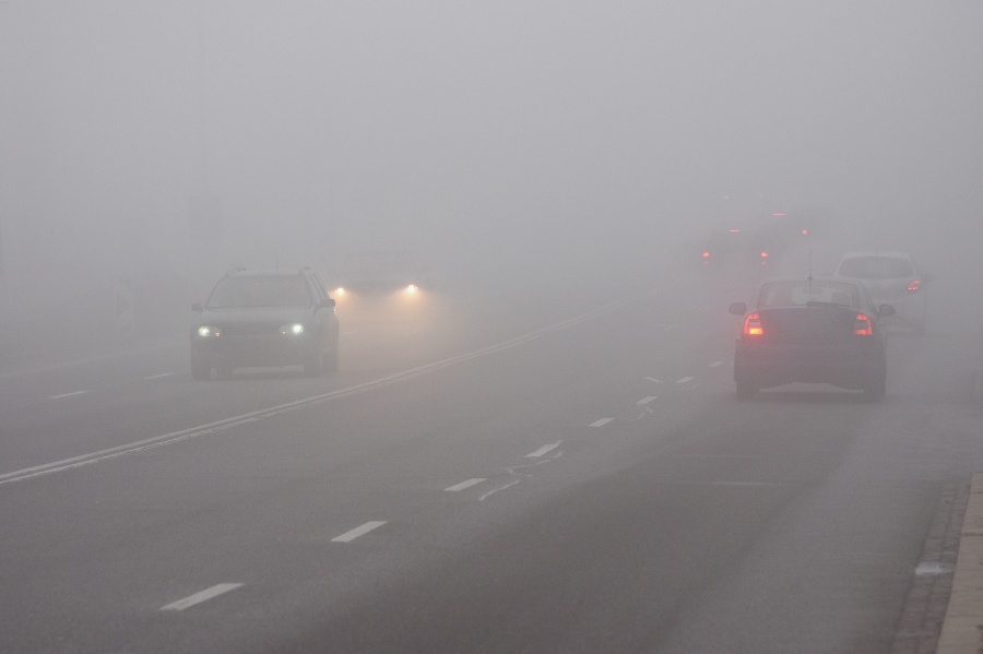 Cars in the fog.