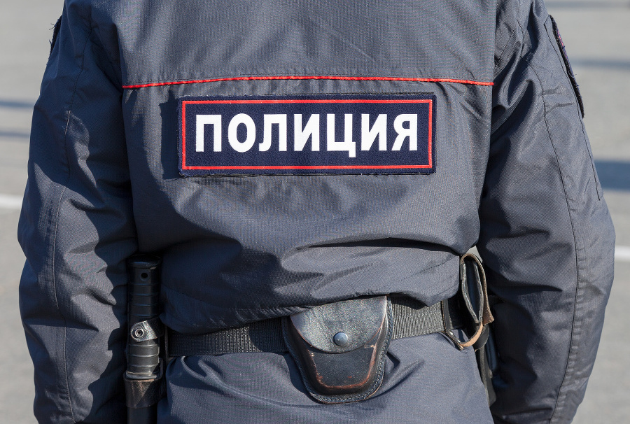 Midsection of russian policeman