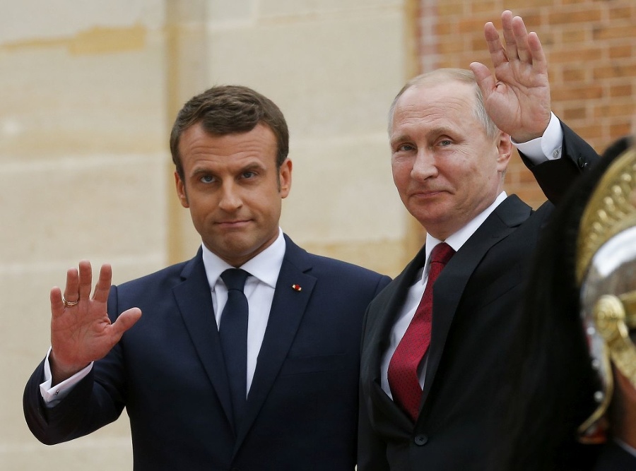 Vladimír Putin (vpravo) na