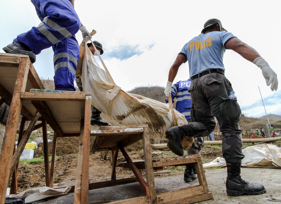 Tacloban City, Leyte - November 16, 2013: A total of 393 cadavers, in black bags, were laid in a mass grave nearby a public cemetery in the northern part of the city in the aftermath of typhoon Haiyan (Yolanda). Only 10-15 percent of the bodies were identified.