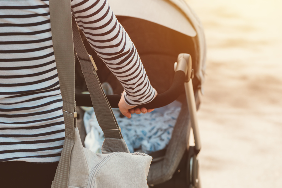 Mother walking with baby