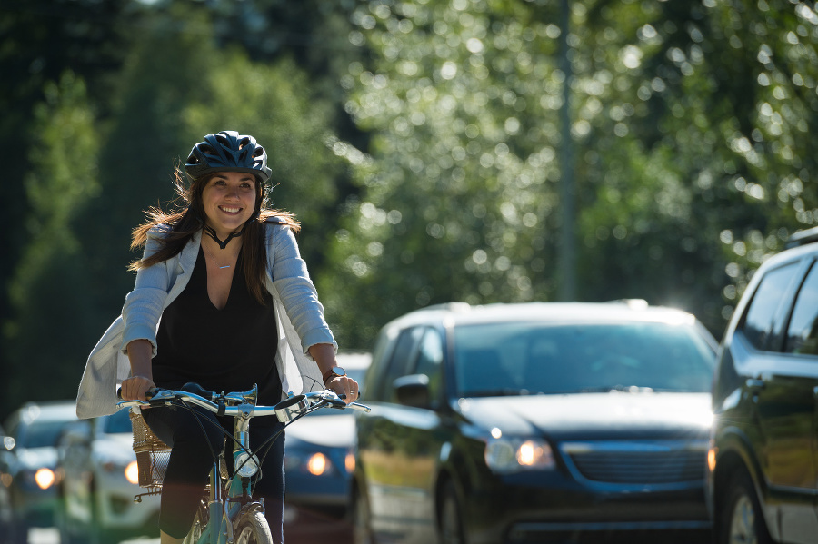 Woman passing traffic on