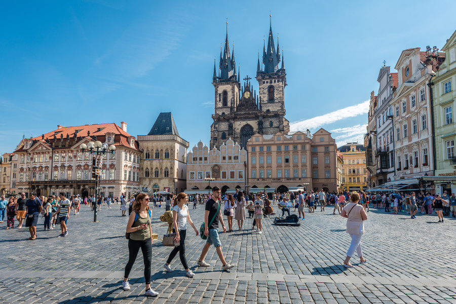 Prague, Czech Republic - July 2, 2016: Tourists visit Old Town Square, the heart of the Czech capital.