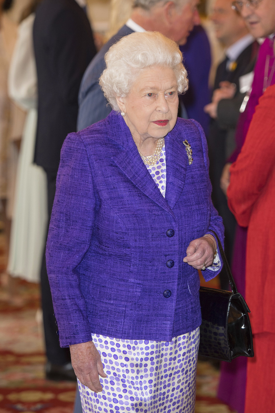 Hostiteľka kráľovná Alžbeta II.