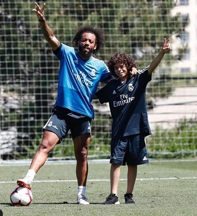 Marcelo so svojim synom.