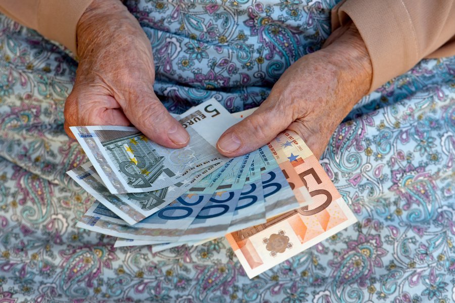 Elderly caucasian woman holding