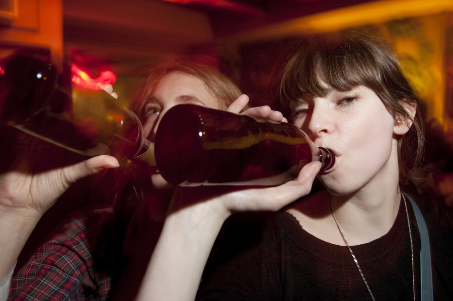 Attractive young women drinking