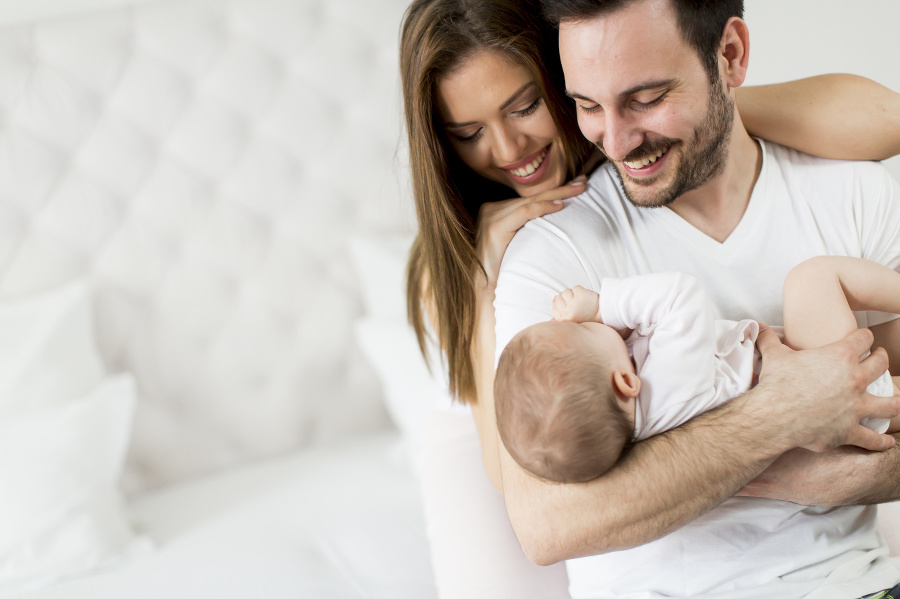 Happy family with newborn