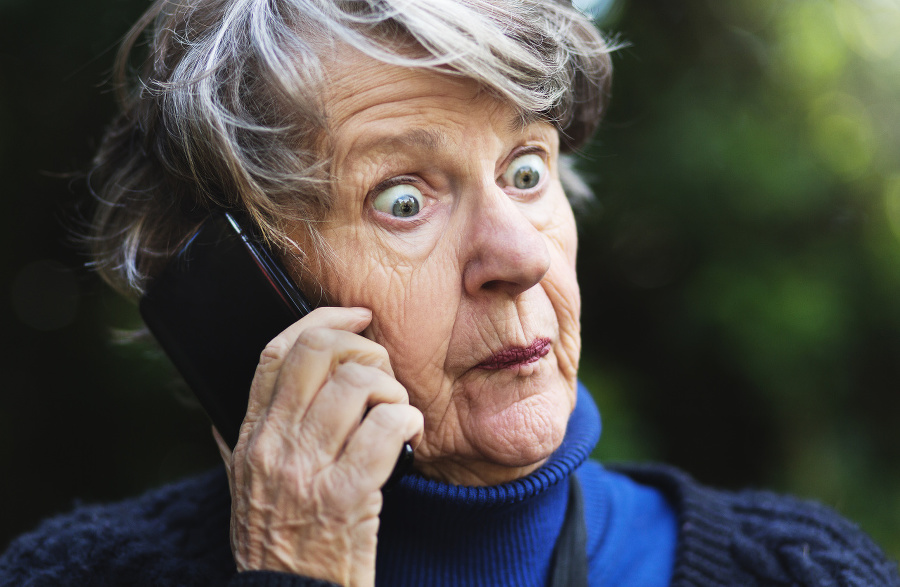 A senior woman listening