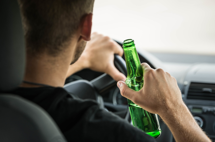 Man drinking beer while