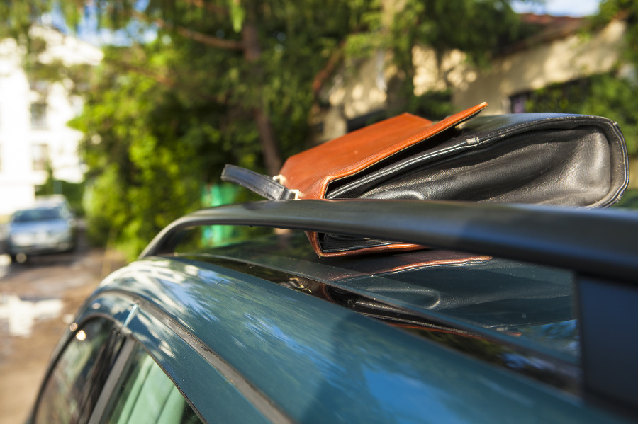 Briefcase on car roof