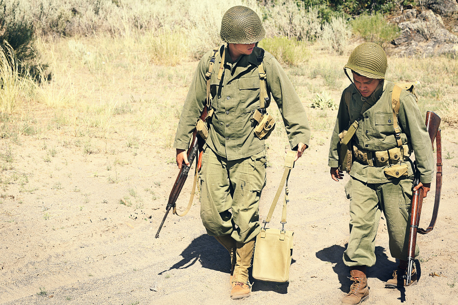 Two soldiers walking along
