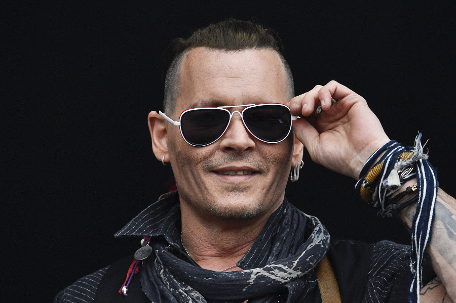 Johnny Depp na koncerte v Prahe.