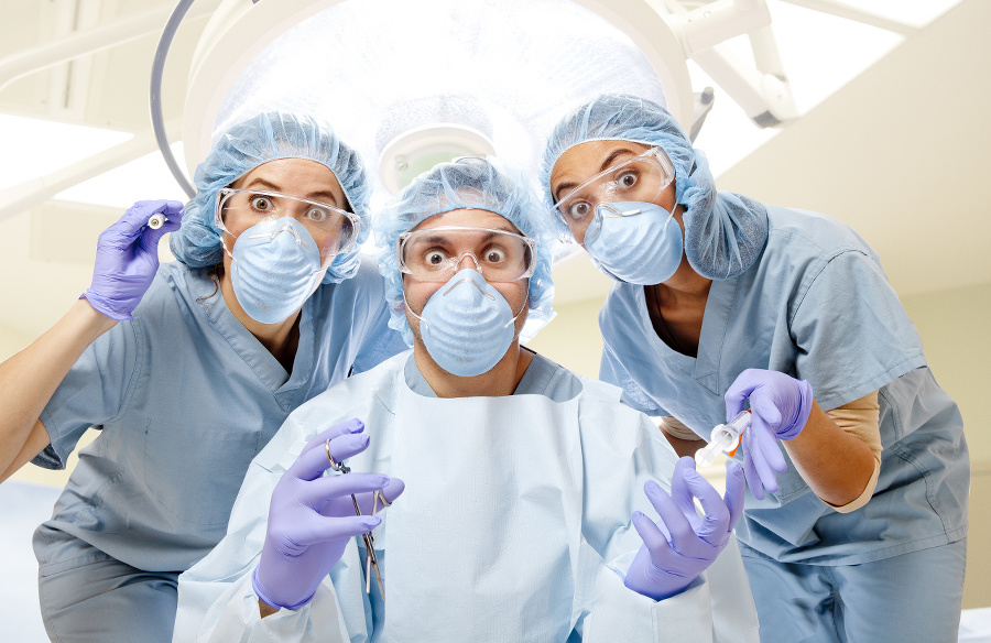 Wide-eyed surgery team in