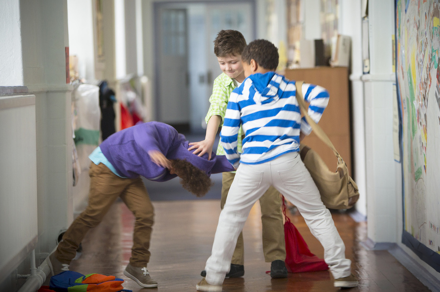 Young Boys fighting in