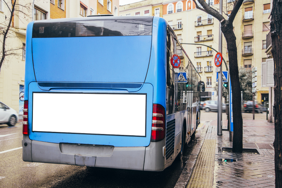 A blue, modern bus