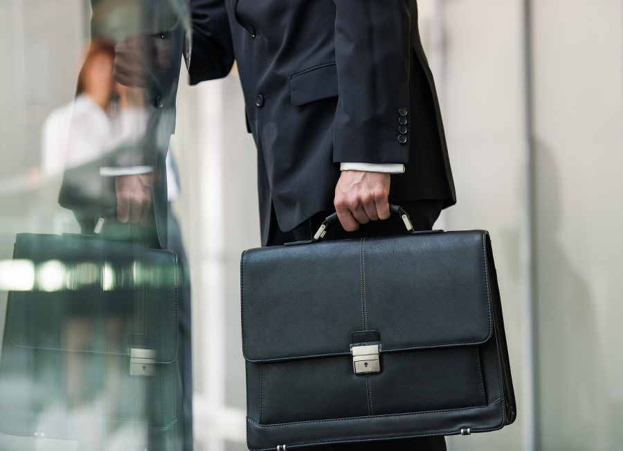 Leather briefcase held by