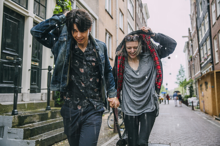 Couple holding hands making