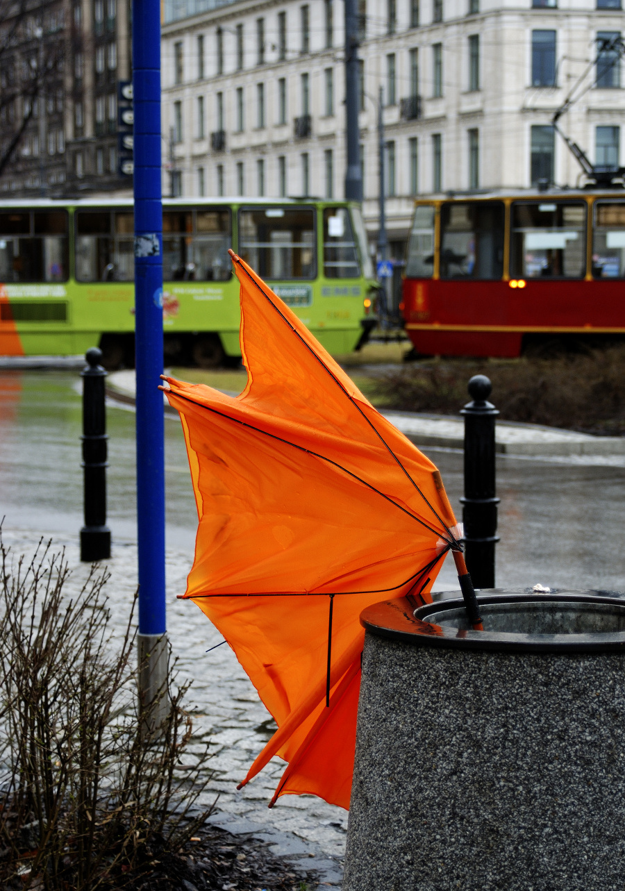 orange broken umbrella after