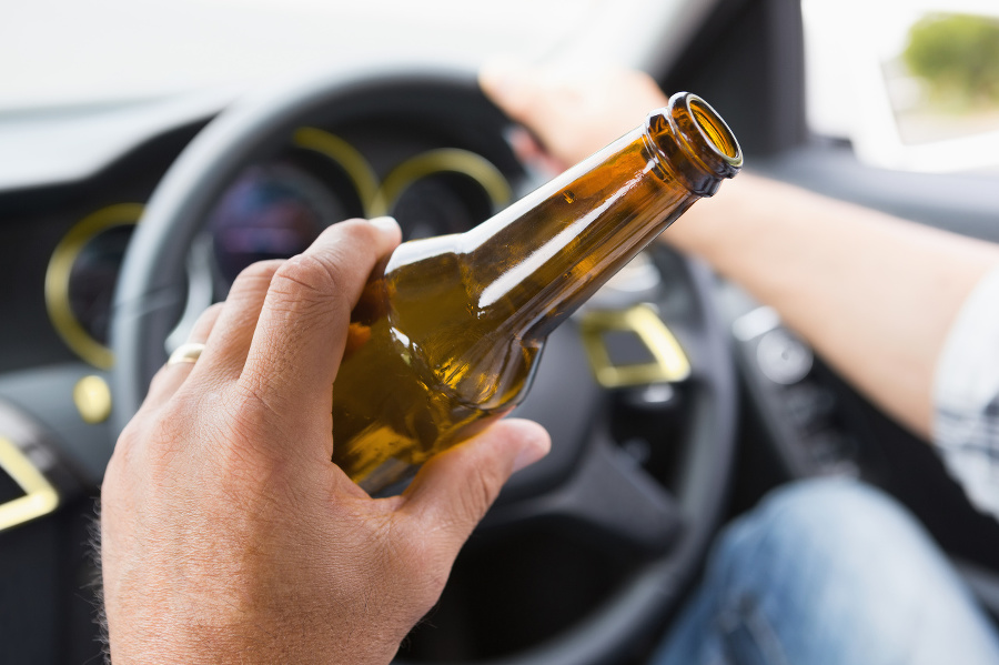 Man drinking beer while