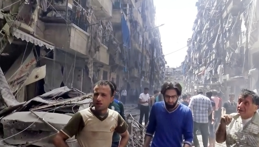 Zrútené budovy v Aleppe