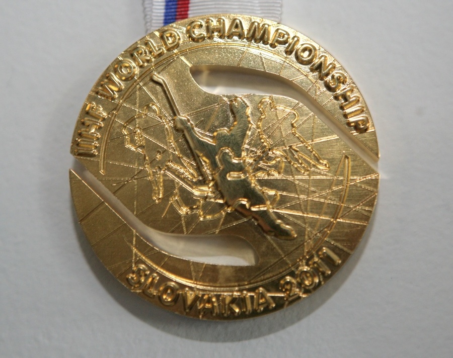 Zlatá medaila pre hokejových