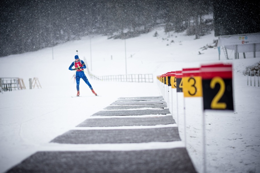 Male biathlete wearing skiwear