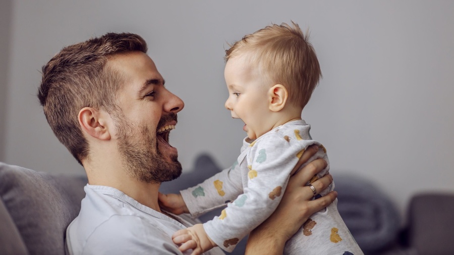 Caring father holding his