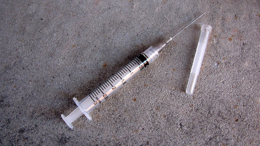 Syringe and needle on