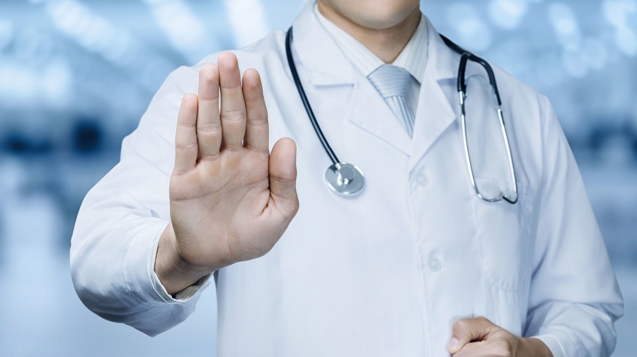 Doctor with forbidden gesture