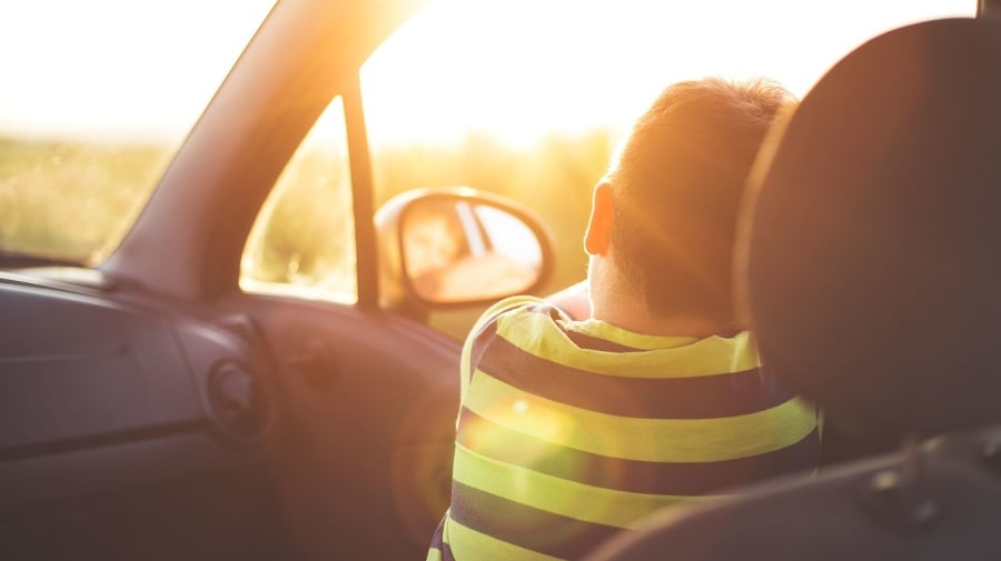 Boy on front seat