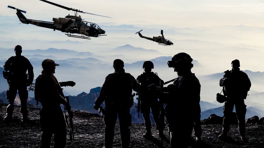 Silhouettes of soldiers during