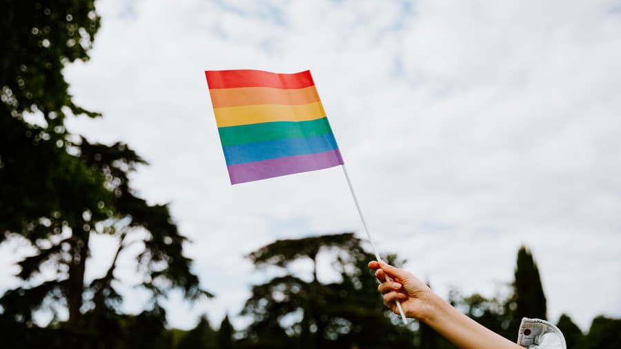 Woman waving lgbti flag