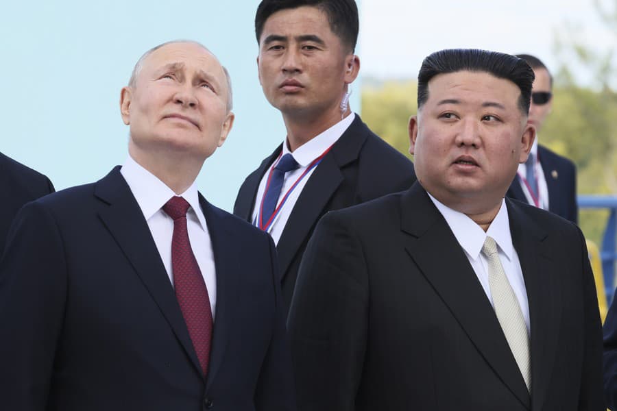 Vladimir Putin a Kim