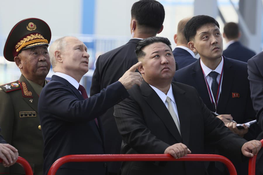 Vladimir Putin a Kim