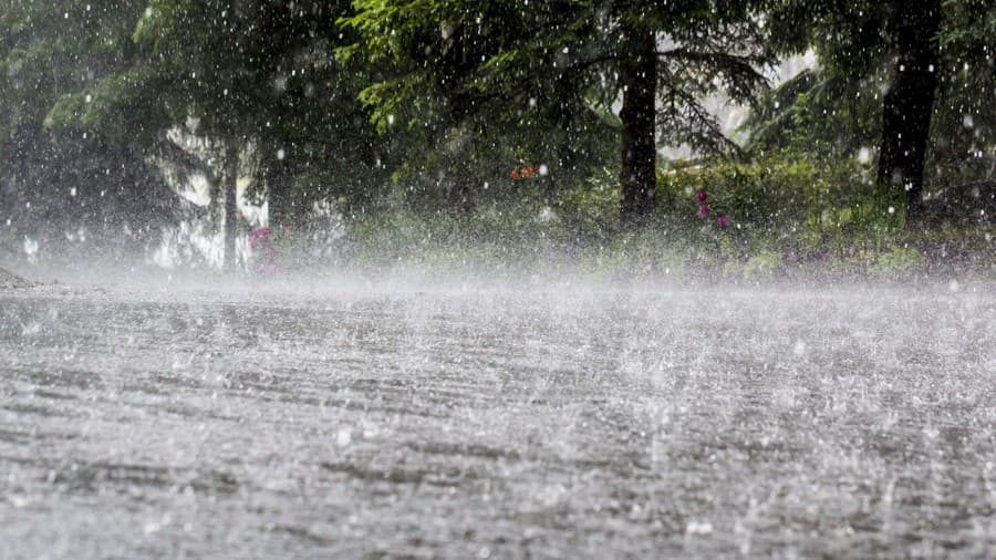 Torrential rain causing flood.