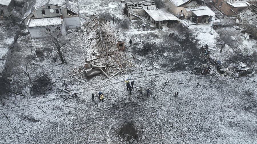Poškodené domy po ruskom