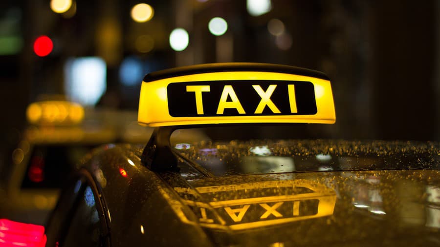 taxi sign at night