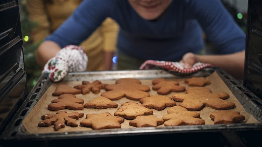 Teenage Girls Baking Christmas