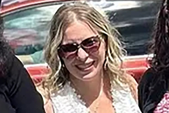Laura Hughes (†50)