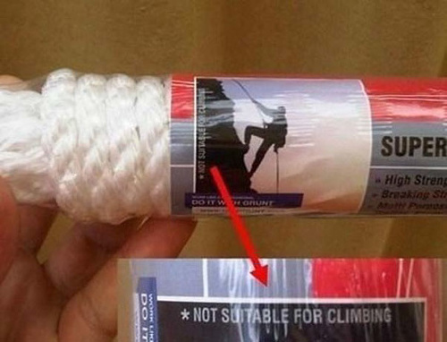Obrázok je s horolezcom, no nápis upozorňuje na to, že to nie je vhodné na lezenie. 