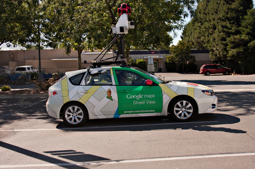 Chico, California, USA - July 12, 2011 : A side shot of a Google Maps Street View car parked in a Chico Grocery store parking lot. The device mounted on top  of  the car contains, lasers, motion sensors and the actual   street view camera used to take street view  pictures of different neighborhoods.