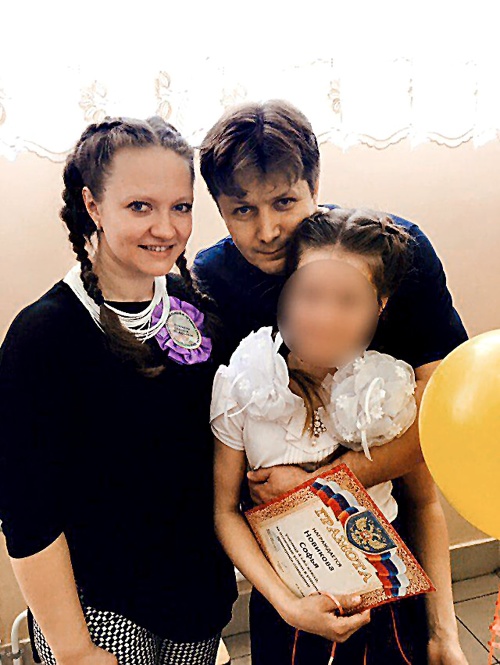 Xénia s manželom Jevgenijom a dcérkou Sofiou