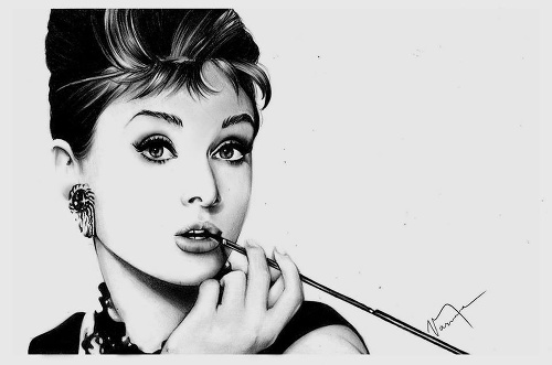 Portrét Audrey Hepburn.