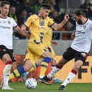 Na snímke zľava hráč Trnavy Jakub Paur, hráč DAC Milan Dimun a hráč Trnavy Kyriakos Savvidis.