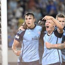 Zľava Dávid Strelec, Nino Marcelli a Juraj Kucka (všetci Slovan) oslavujú gól