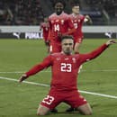 Na snímke v popredí švajčiarsky stredopoliar Xherdan Shaqiri oslavuje svoj úvodný gól v zápase I-skupiny kvalifikácie ME 2024 vo futbale Švajčiarsko - Bielorusko.