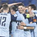 Na snímke druhý sprava Marko Tolič (Slovan) sa teší so spoluhráčmi po strelení svojho druhého gólu.