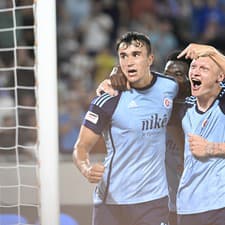 Zľava Dávid Strelec, Nino Marcelli a Juraj Kucka (všetci Slovan) oslavujú gól