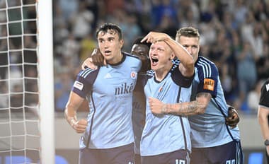 Zľava Dávid Strelec, Nino Marcelli a Juraj Kucka (všetci Slovan) oslavujú gól